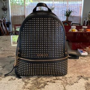 Michael Kors Black Leather Backpack with Gold and Silver Embellishments